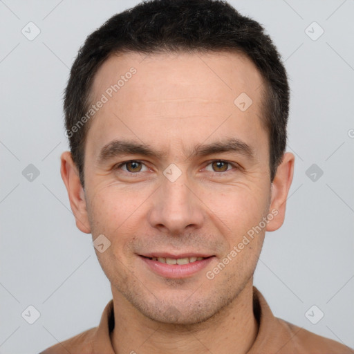 Joyful white adult male with short  brown hair and brown eyes