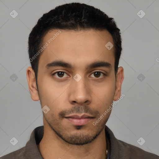 Neutral latino young-adult male with short  black hair and brown eyes