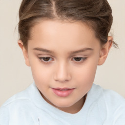 Joyful white child female with short  brown hair and brown eyes