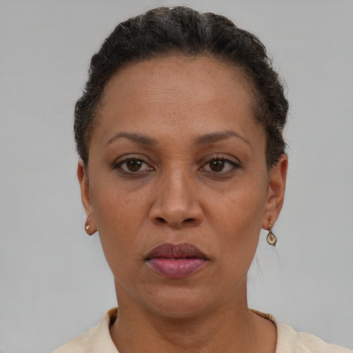Neutral black adult female with short  brown hair and brown eyes