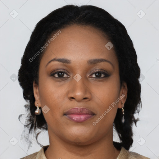 Joyful black young-adult female with medium  brown hair and brown eyes