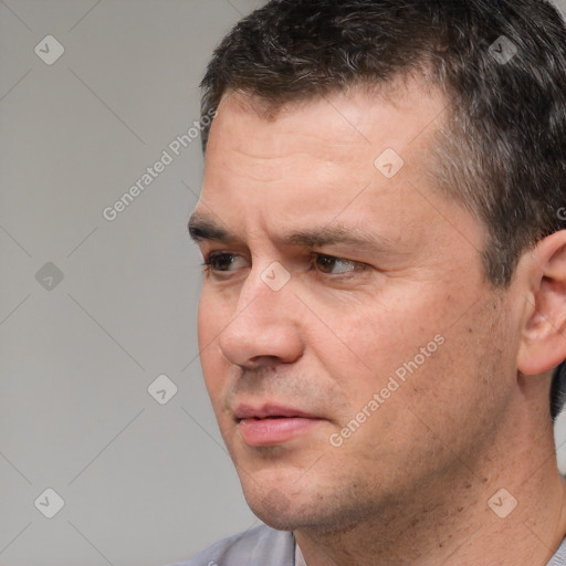 Neutral white adult male with short  brown hair and brown eyes