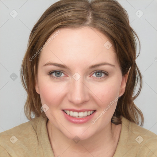 Joyful white young-adult female with medium  brown hair and blue eyes