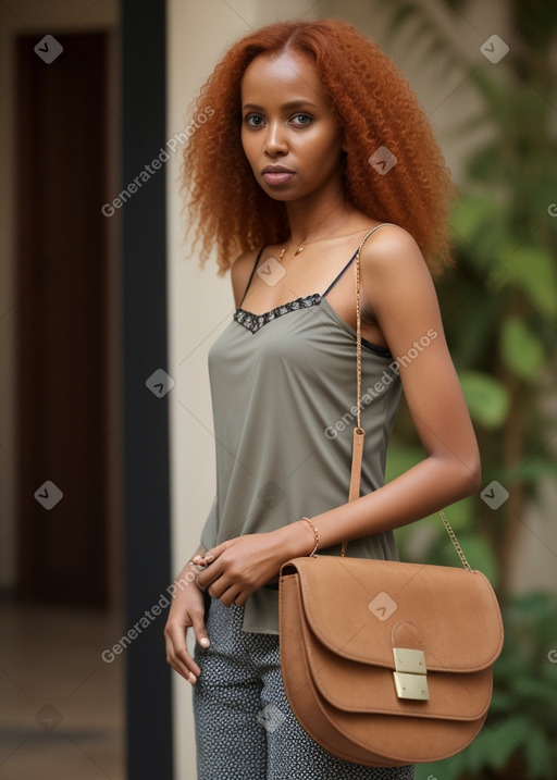 Somali adult female with  ginger hair