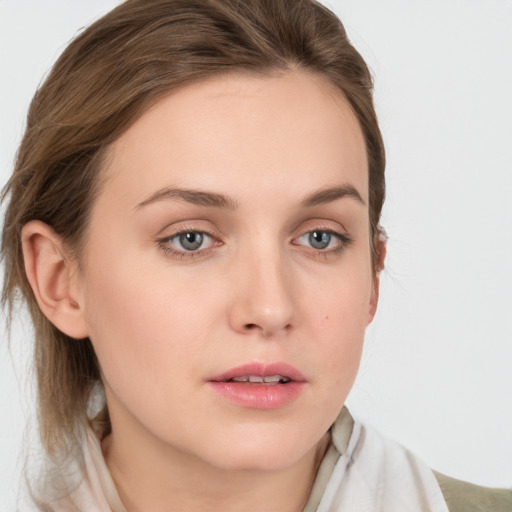 Neutral white young-adult female with medium  brown hair and grey eyes