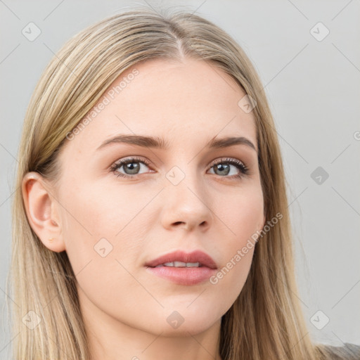 Neutral white young-adult female with long  brown hair and brown eyes