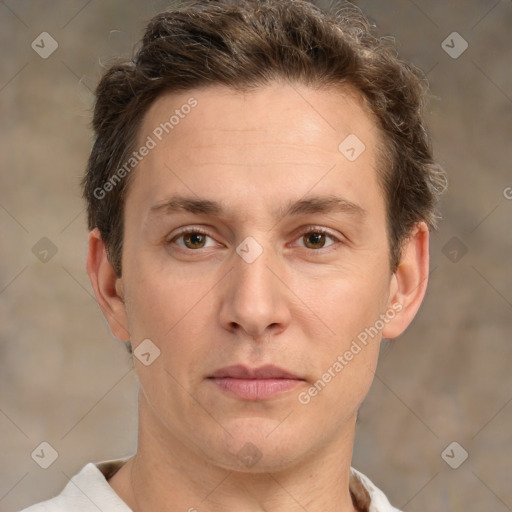 Joyful white adult male with short  brown hair and grey eyes