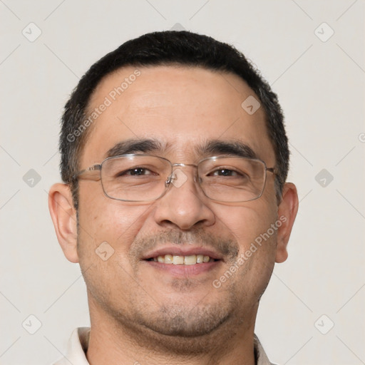 Joyful white adult male with short  brown hair and brown eyes