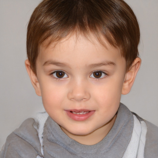 Joyful white child male with short  brown hair and brown eyes