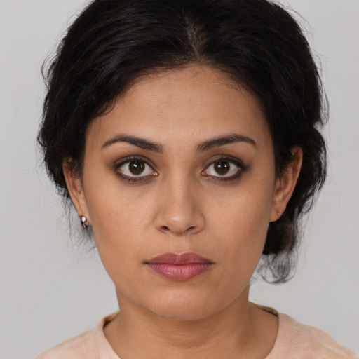 Neutral white young-adult female with medium  brown hair and brown eyes