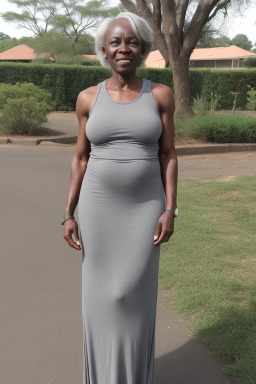 Zimbabwean 45 years female with  gray hair