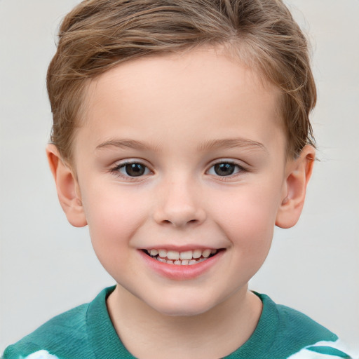 Joyful white child female with short  brown hair and grey eyes