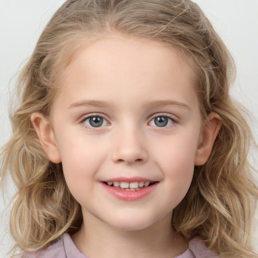 Joyful white child female with medium  brown hair and blue eyes