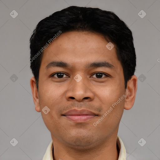 Joyful latino young-adult male with short  black hair and brown eyes