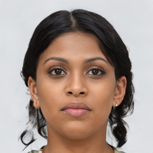 Neutral latino young-adult female with medium  brown hair and brown eyes