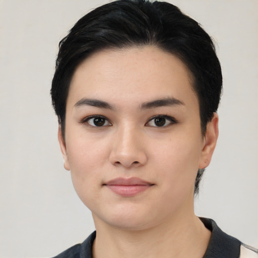 Neutral white young-adult female with short  black hair and brown eyes