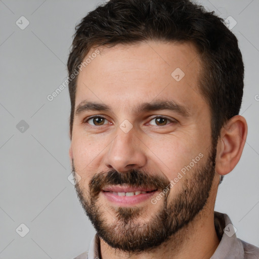 Joyful white young-adult male with short  brown hair and brown eyes