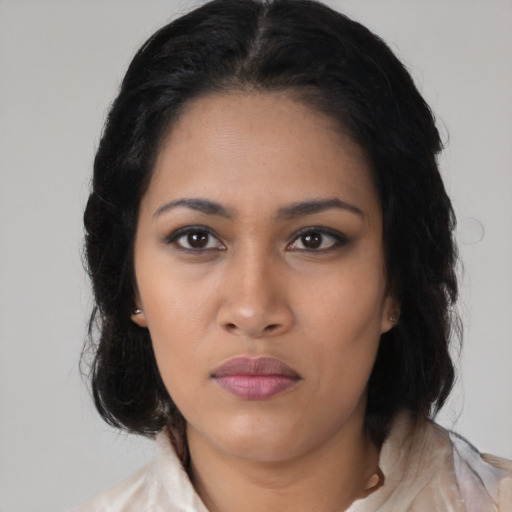 Neutral latino young-adult female with medium  black hair and brown eyes