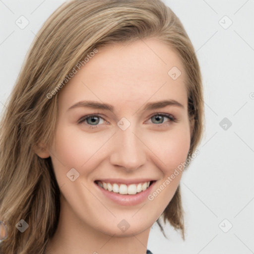 Joyful white young-adult female with long  brown hair and green eyes