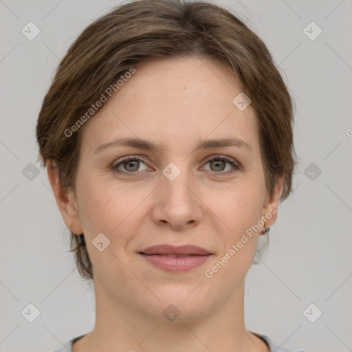 Joyful white adult female with short  brown hair and grey eyes