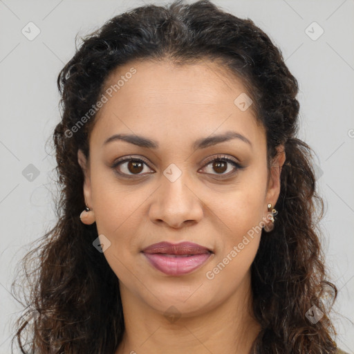 Joyful latino young-adult female with long  brown hair and brown eyes