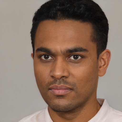 Neutral latino young-adult male with short  black hair and brown eyes