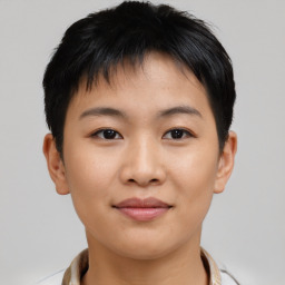 Joyful asian young-adult female with short  brown hair and brown eyes