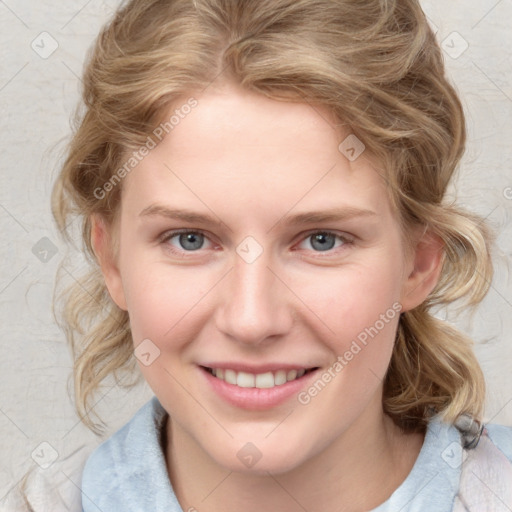 Joyful white young-adult female with medium  brown hair and blue eyes