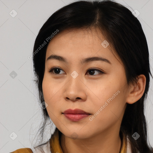 Joyful asian young-adult female with medium  black hair and brown eyes