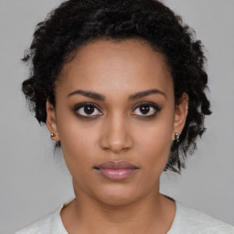 Neutral black young-adult female with short  black hair and brown eyes