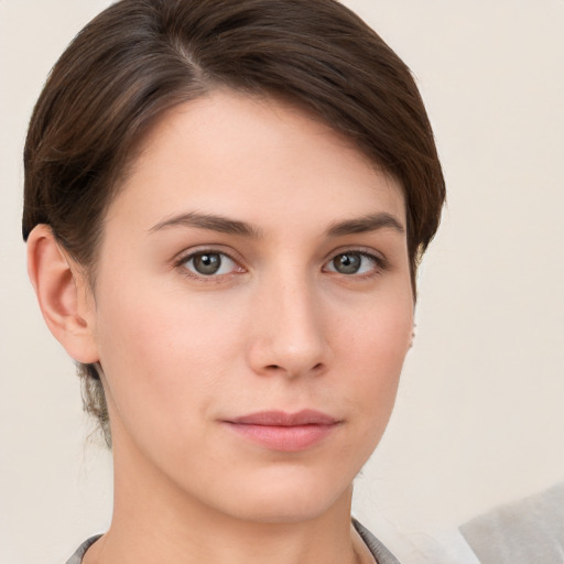 Neutral white young-adult female with short  brown hair and brown eyes