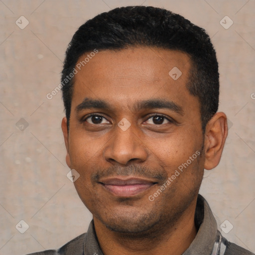 Joyful latino young-adult male with short  black hair and brown eyes