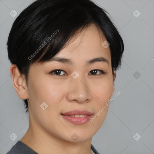 Joyful asian young-adult female with medium  brown hair and brown eyes