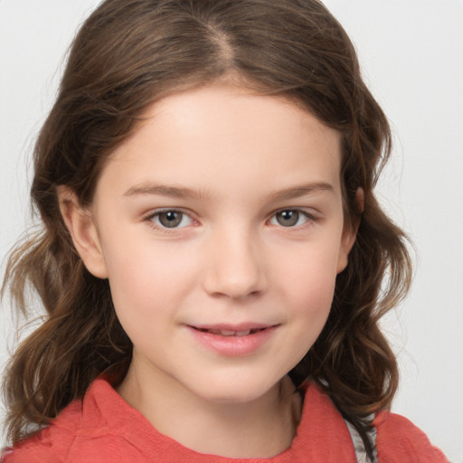 Joyful white child female with medium  brown hair and brown eyes