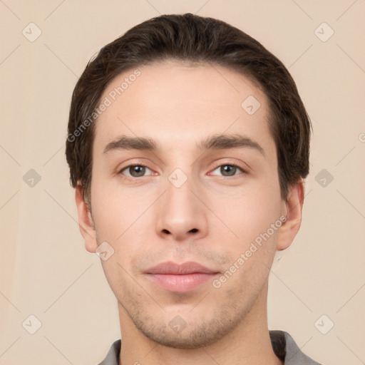 Neutral white young-adult male with short  brown hair and brown eyes