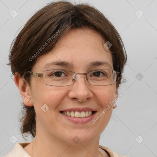 Joyful white adult female with medium  brown hair and brown eyes