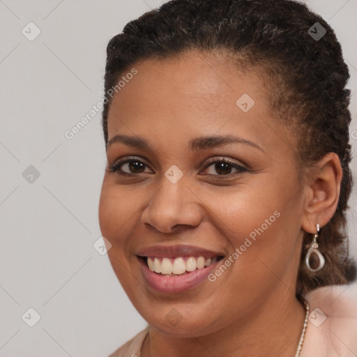 Joyful latino young-adult female with short  brown hair and brown eyes