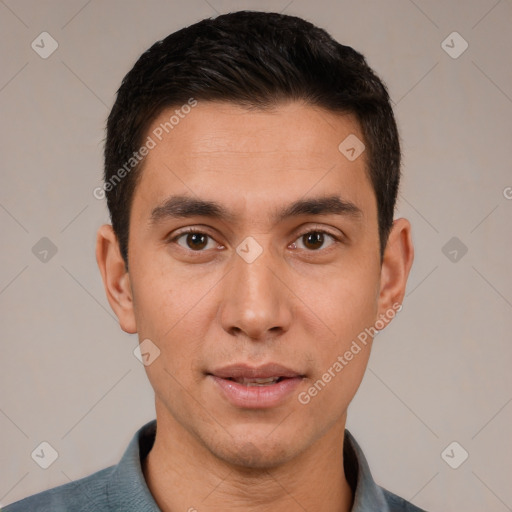 Joyful white young-adult male with short  black hair and brown eyes