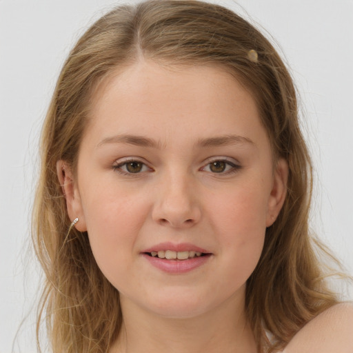 Joyful white child female with long  brown hair and grey eyes