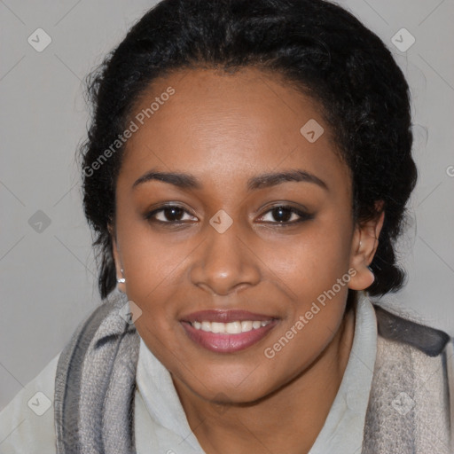 Joyful black young-adult female with medium  black hair and brown eyes