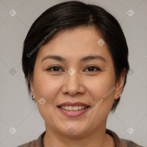 Joyful white adult female with medium  brown hair and brown eyes