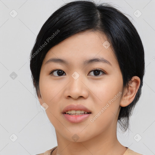 Joyful asian young-adult female with medium  black hair and brown eyes