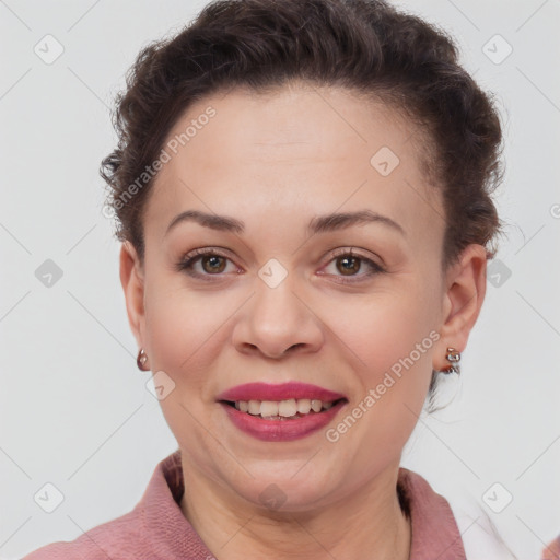 Joyful white adult female with short  brown hair and brown eyes