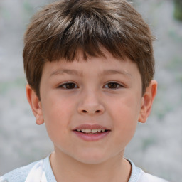 Joyful white child male with short  brown hair and brown eyes