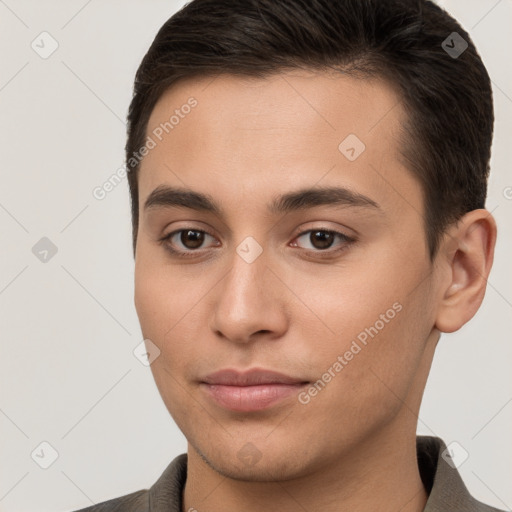 Joyful white young-adult male with short  brown hair and brown eyes