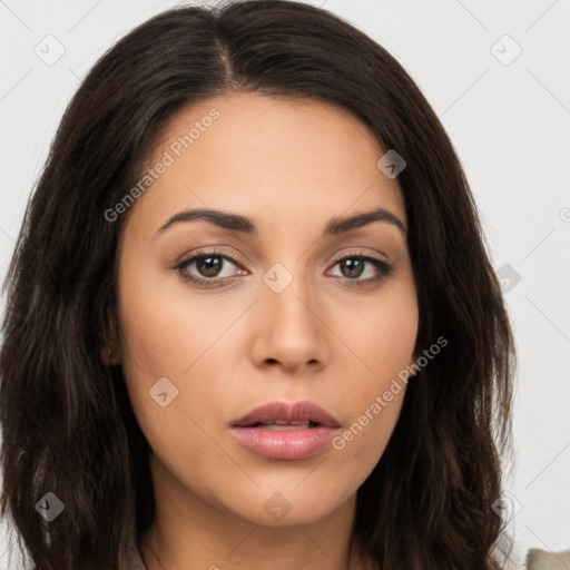 Neutral white young-adult female with long  brown hair and brown eyes