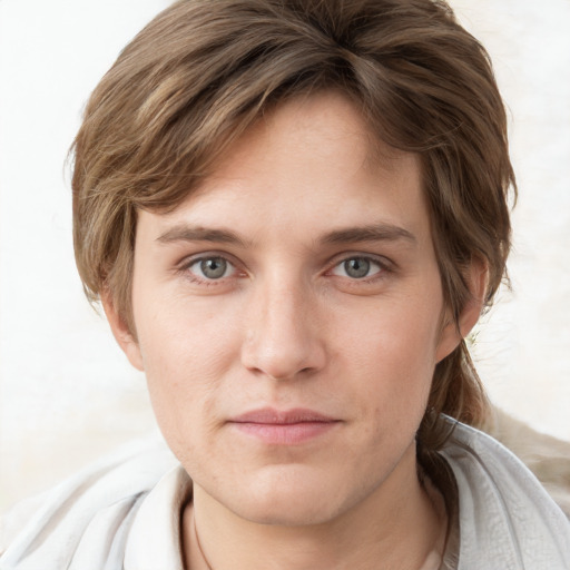 Joyful white young-adult female with medium  brown hair and blue eyes