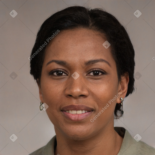 Joyful black young-adult female with medium  brown hair and brown eyes