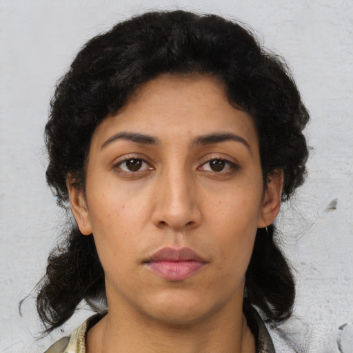 Neutral latino young-adult female with medium  black hair and brown eyes