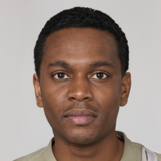 Neutral black young-adult male with short  black hair and brown eyes